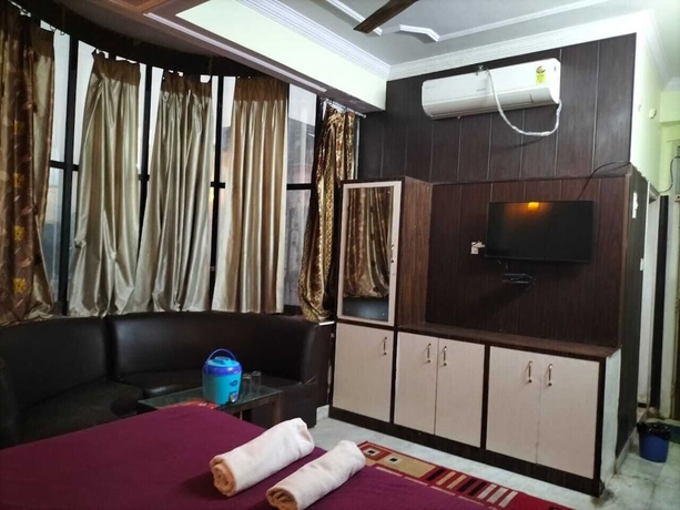 Imagen de la habitación del Hotel City Heart, Haridwar. Foto 11