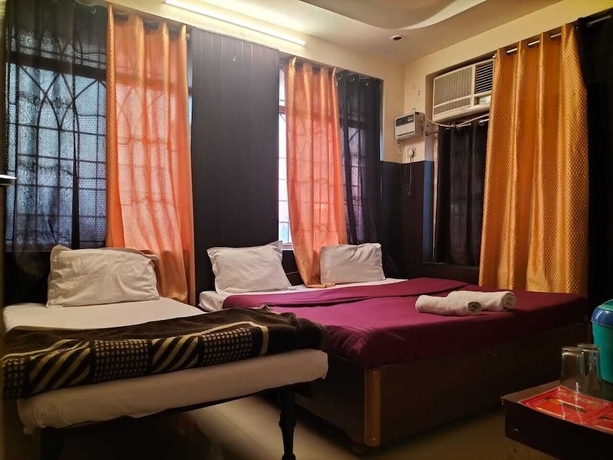 Imagen de la habitación del Hotel City Heart, Haridwar. Foto 12
