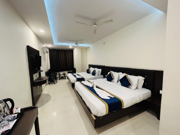 Imagen de la habitación del Hotel City Heritage Haridwar. Foto 2