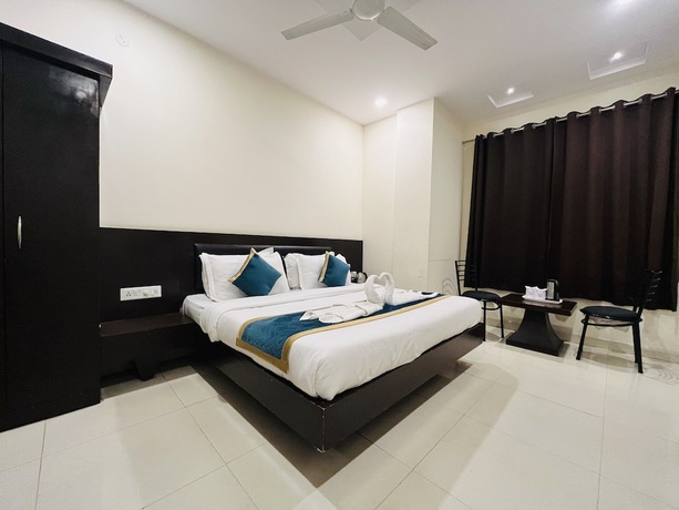 Imagen de la habitación del Hotel City Heritage Haridwar. Foto 3