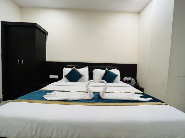 Imagen de la habitación del Hotel City Heritage Haridwar. Foto 4