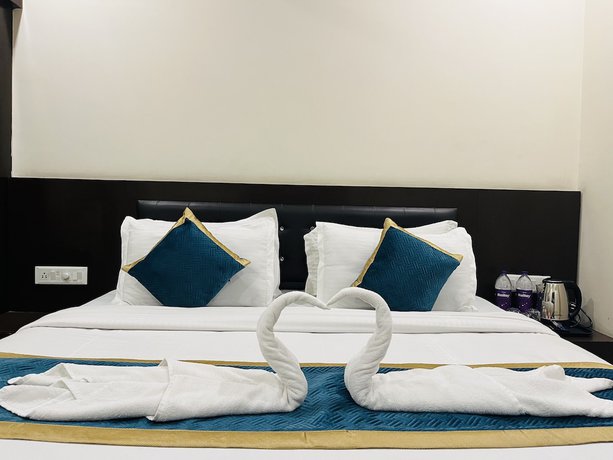 Imagen de la habitación del Hotel City Heritage Haridwar. Foto 5