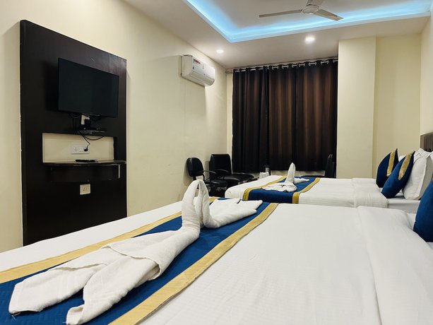 Imagen de la habitación del Hotel City Heritage Haridwar. Foto 6