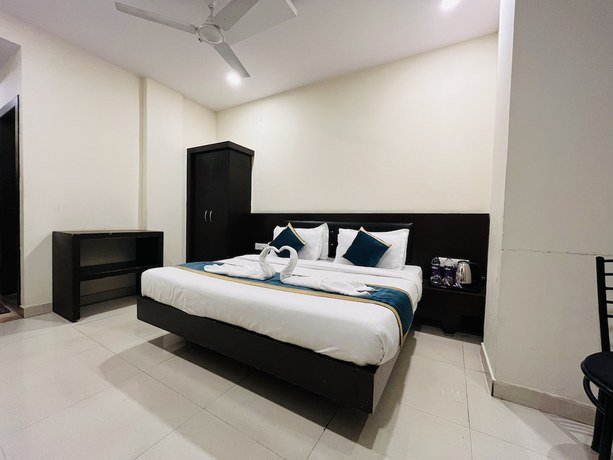 Imagen de la habitación del Hotel City Heritage Haridwar. Foto 7