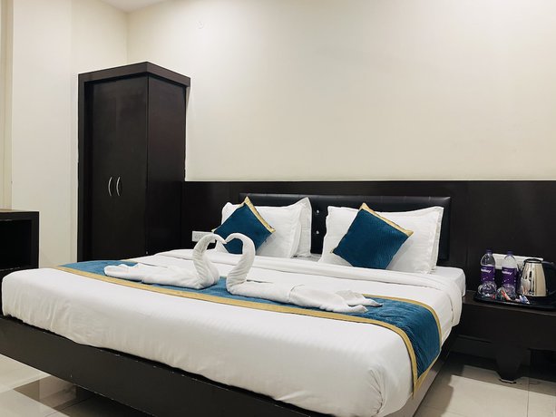 Imagen de la habitación del Hotel City Heritage Haridwar. Foto 10