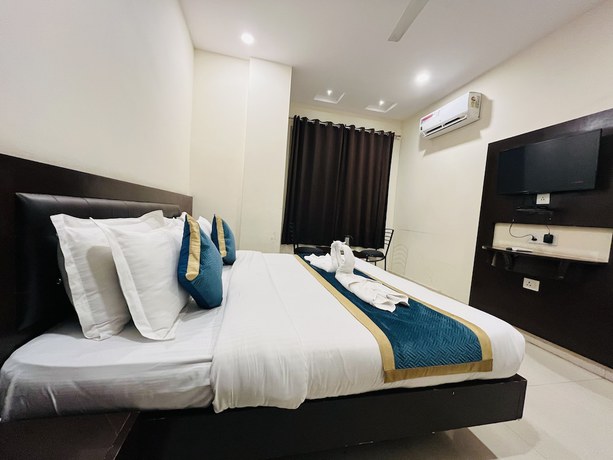 Imagen de la habitación del Hotel City Heritage Haridwar. Foto 12