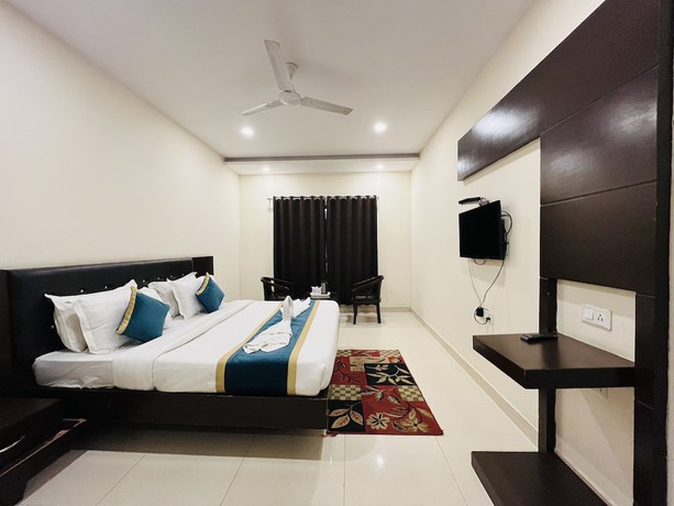 Imagen de la habitación del Hotel City Heritage Haridwar. Foto 14