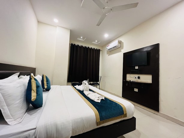 Imagen de la habitación del Hotel City Heritage Haridwar. Foto 15