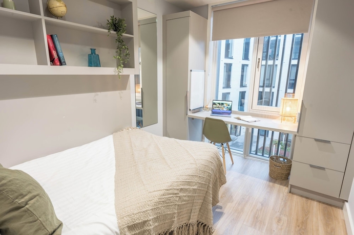 Imagen de la habitación del Hotel City HideAway. Foto 4