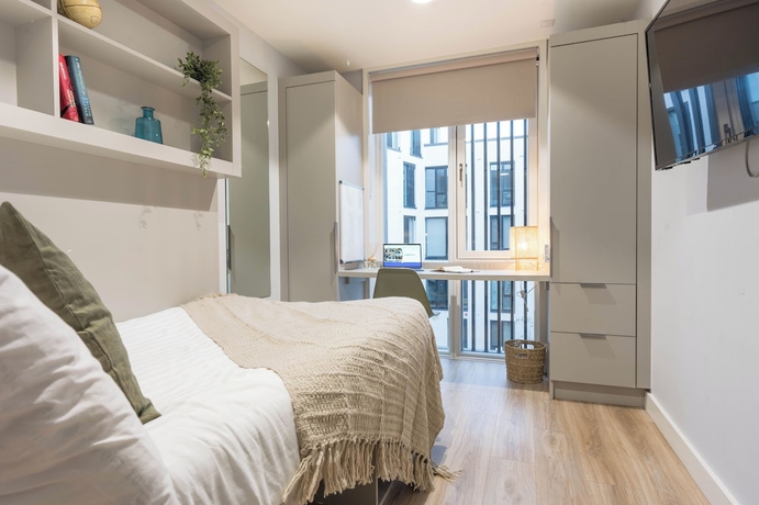 Imagen de la habitación del Hotel City HideAway. Foto 9