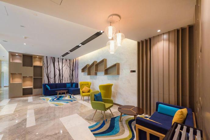 Imagen de los interiores del Hotel City Holiday Guangzhou Baiyun Airport. Foto 16