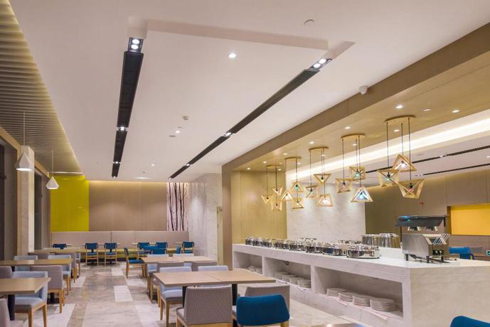Imagen del bar/restaurante del Hotel City Holiday Guangzhou Baiyun Airport. Foto 5