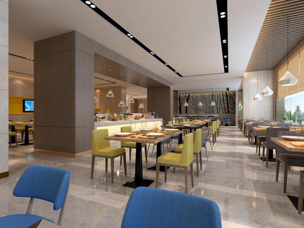 Imagen del bar/restaurante del Hotel City Holiday Guangzhou Baiyun Airport. Foto 6