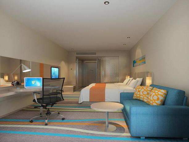 Imagen de la habitación del Hotel City Holiday Guangzhou Baiyun Airport. Foto 10