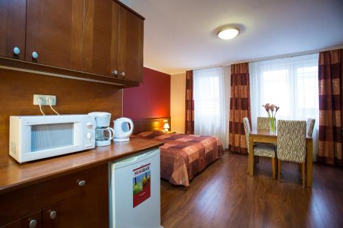 Imagen de la habitación del Hotel City Home Budapest. Foto 2