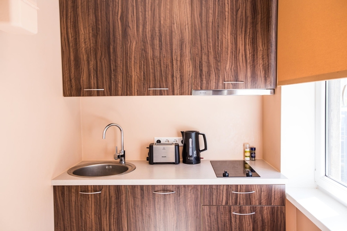 Imagen de la habitación del Hotel City Inn Apartments. Foto 5