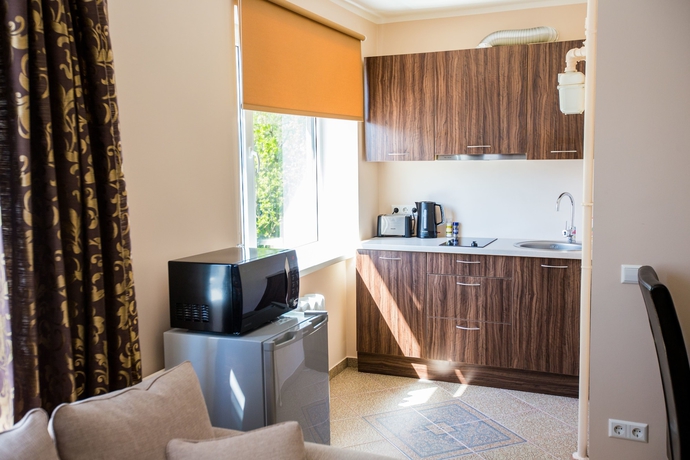 Imagen de la habitación del Hotel City Inn Apartments. Foto 6