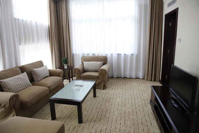 Imagen de la habitación del Hotel City Inn Happy Valley. Foto 8