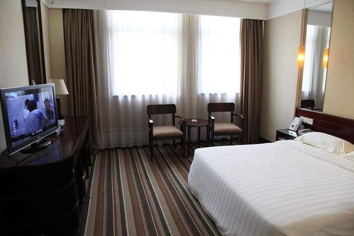 Imagen de la habitación del Hotel City Inn Happy Valley. Foto 10