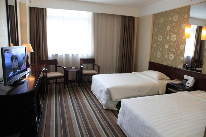 Imagen de la habitación del Hotel City Inn Happy Valley. Foto 14