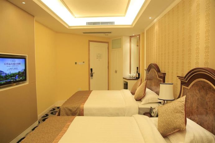 Imagen de la habitación del Hotel City Inn Happy Valley. Foto 15