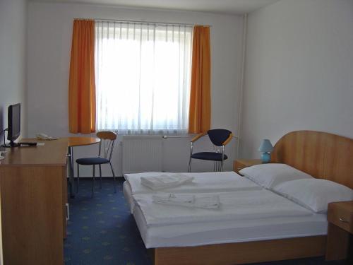 Imagen de la habitación del Hotel City Inn Hotel Olomouc. Foto 6