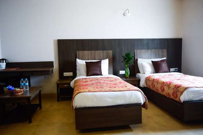 Imagen de la habitación del Hotel City Inn, Jabalpur. Foto 19
