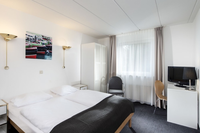 Imagen de la habitación del Hotel City Inn Leipzig. Foto 9