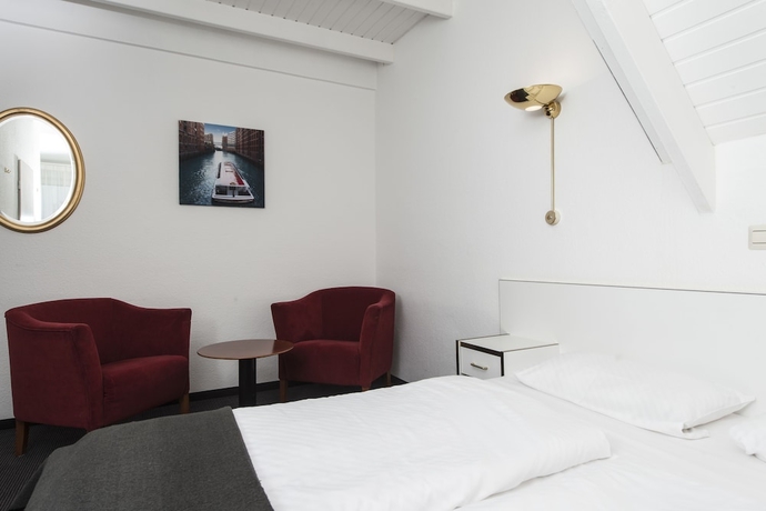 Imagen de la habitación del Hotel City Inn Leipzig. Foto 11