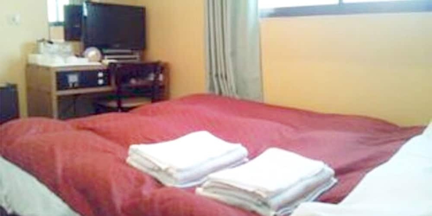 Imagen de la habitación del Hotel City Inn Nishitanabe. Foto 8