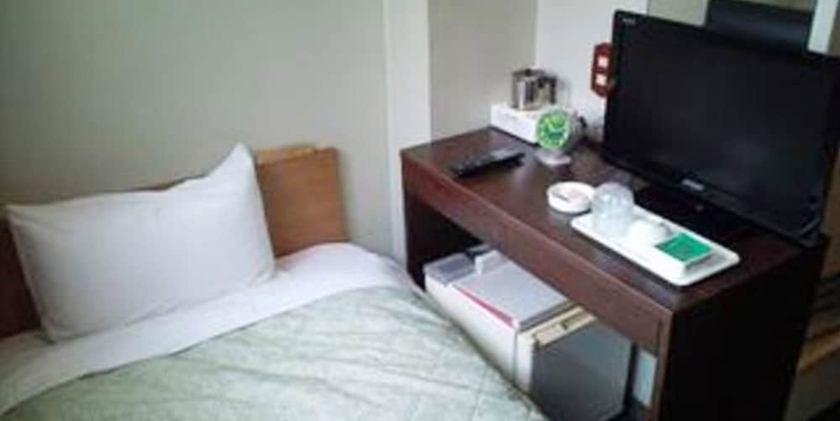 Imagen de la habitación del Hotel City Inn Nishitanabe. Foto 12