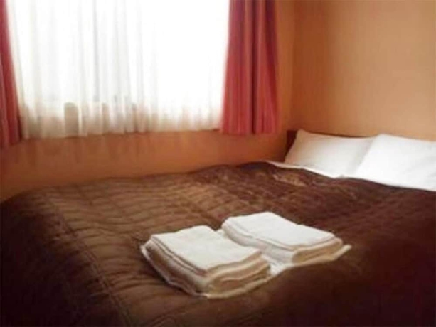 Imagen de la habitación del Hotel City Inn Nishitanabe. Foto 16