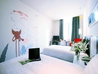 Imagen de la habitación del Hotel City Inn OCT Loft. Foto 3