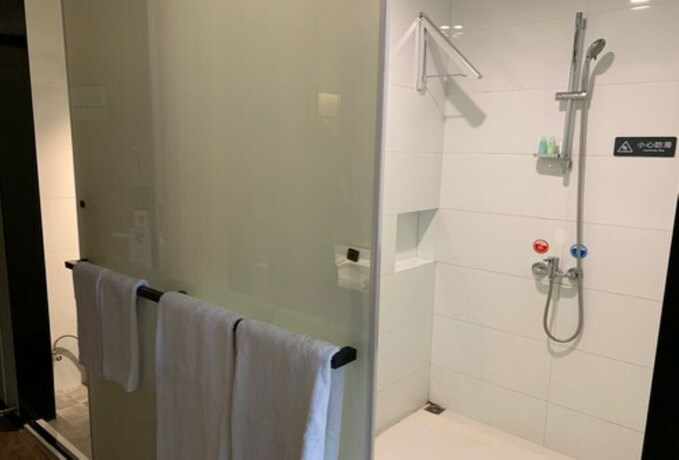 Imagen de la habitación del Hotel City Inn Oct Loft Branch. Foto 12