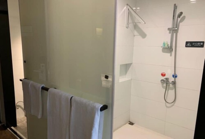 Imagen de la habitación del Hotel City Inn Oct Loft Branch. Foto 19