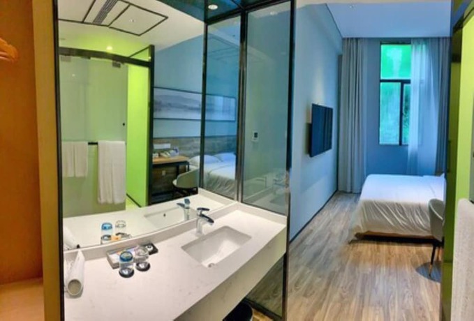 Imagen de la habitación del Hotel City Inn Oct Loft Branch. Foto 22