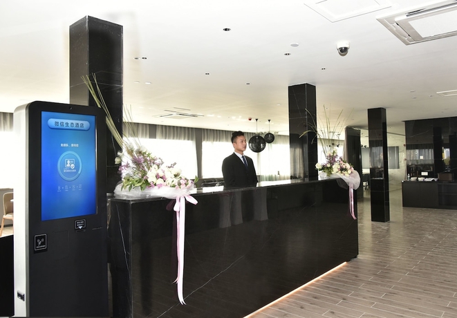 Imagen de los interiores del Hotel City Inn Splendid China Branch. Foto 19