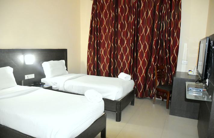 Imagen de la habitación del Hotel City Inn Varanasi. Foto 5