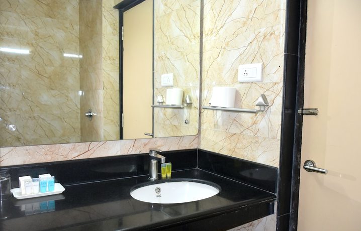 Imagen de la habitación del Hotel City Inn Varanasi. Foto 6
