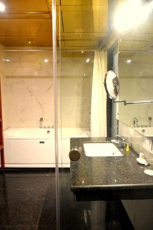 Imagen de la habitación del Hotel City Inn Varanasi. Foto 7
