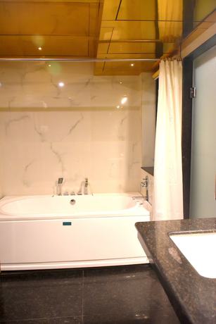 Imagen de la habitación del Hotel City Inn Varanasi. Foto 11