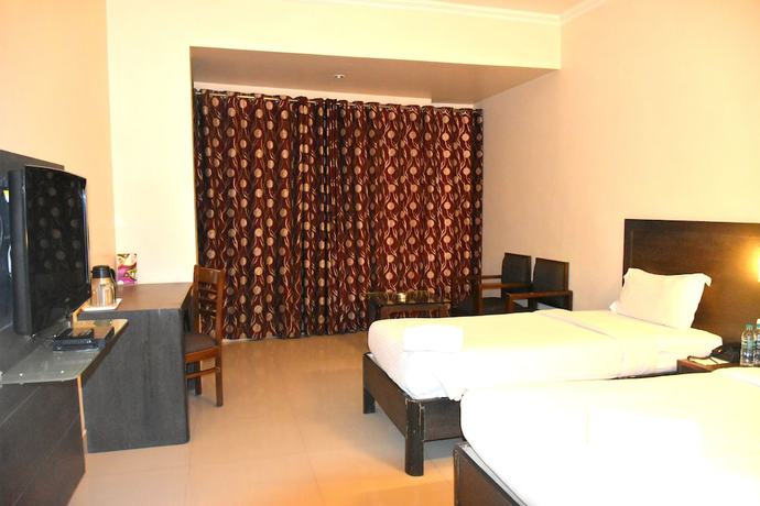 Imagen de la habitación del Hotel City Inn Varanasi. Foto 12