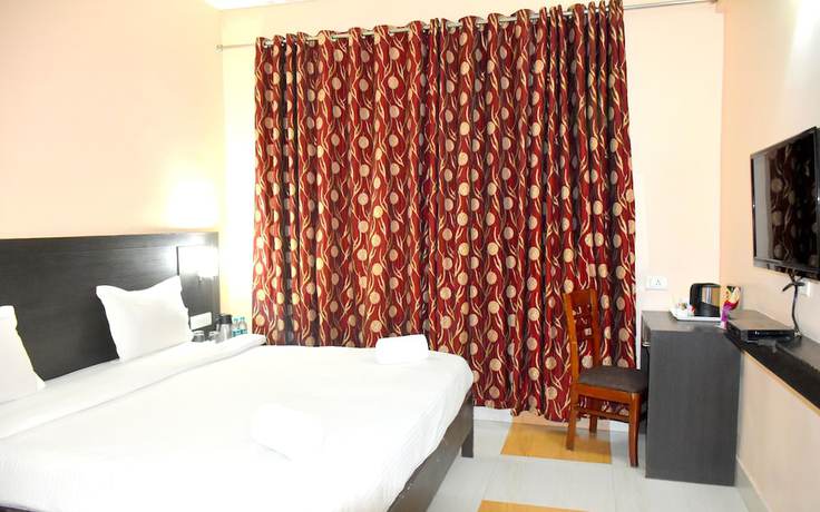 Imagen de la habitación del Hotel City Inn Varanasi. Foto 14