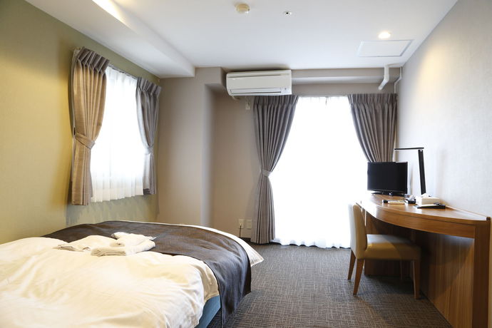 Imagen de la habitación del Hotel City Inn Wakayama. Foto 5