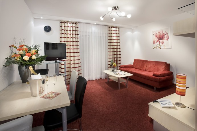 Imagen de la habitación del Hotel City Isar Residenz. Foto 9