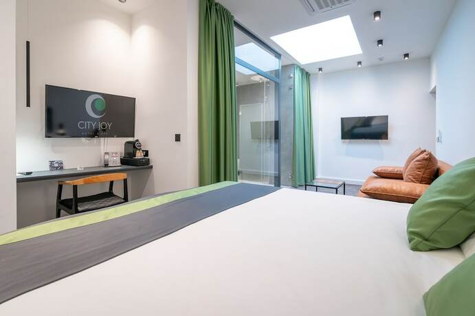 Imagen de la habitación del Hotel City Joy Tasmajdan. Foto 15
