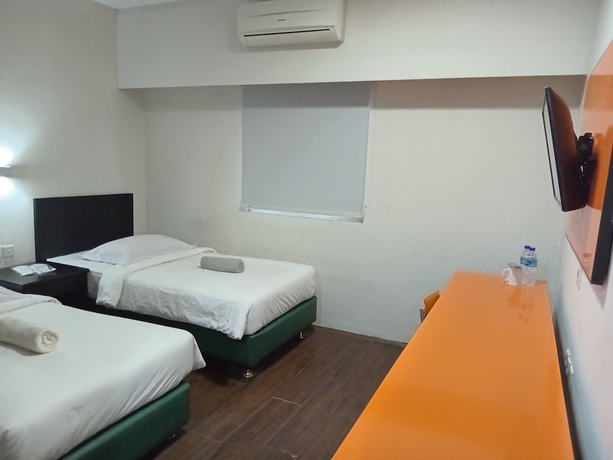 Imagen de la habitación del Hotel City, Klandasan Ulu. Foto 8