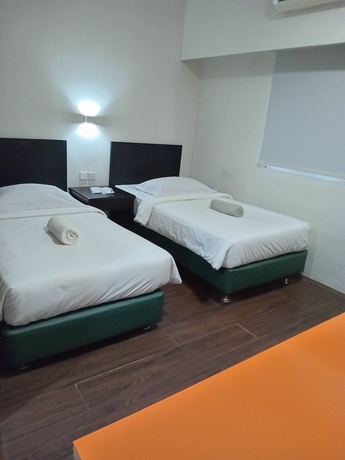 Imagen de la habitación del Hotel City, Klandasan Ulu. Foto 9