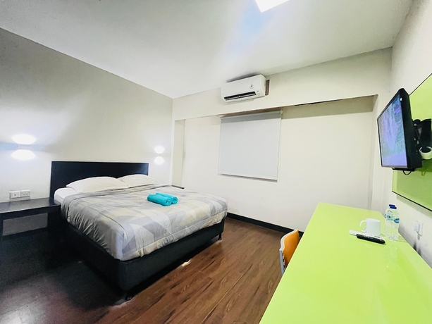 Imagen de la habitación del Hotel City, Klandasan Ulu. Foto 10