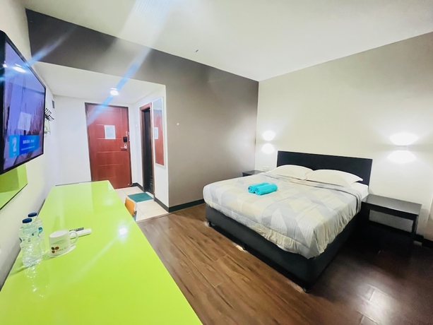 Imagen de la habitación del Hotel City, Klandasan Ulu. Foto 11